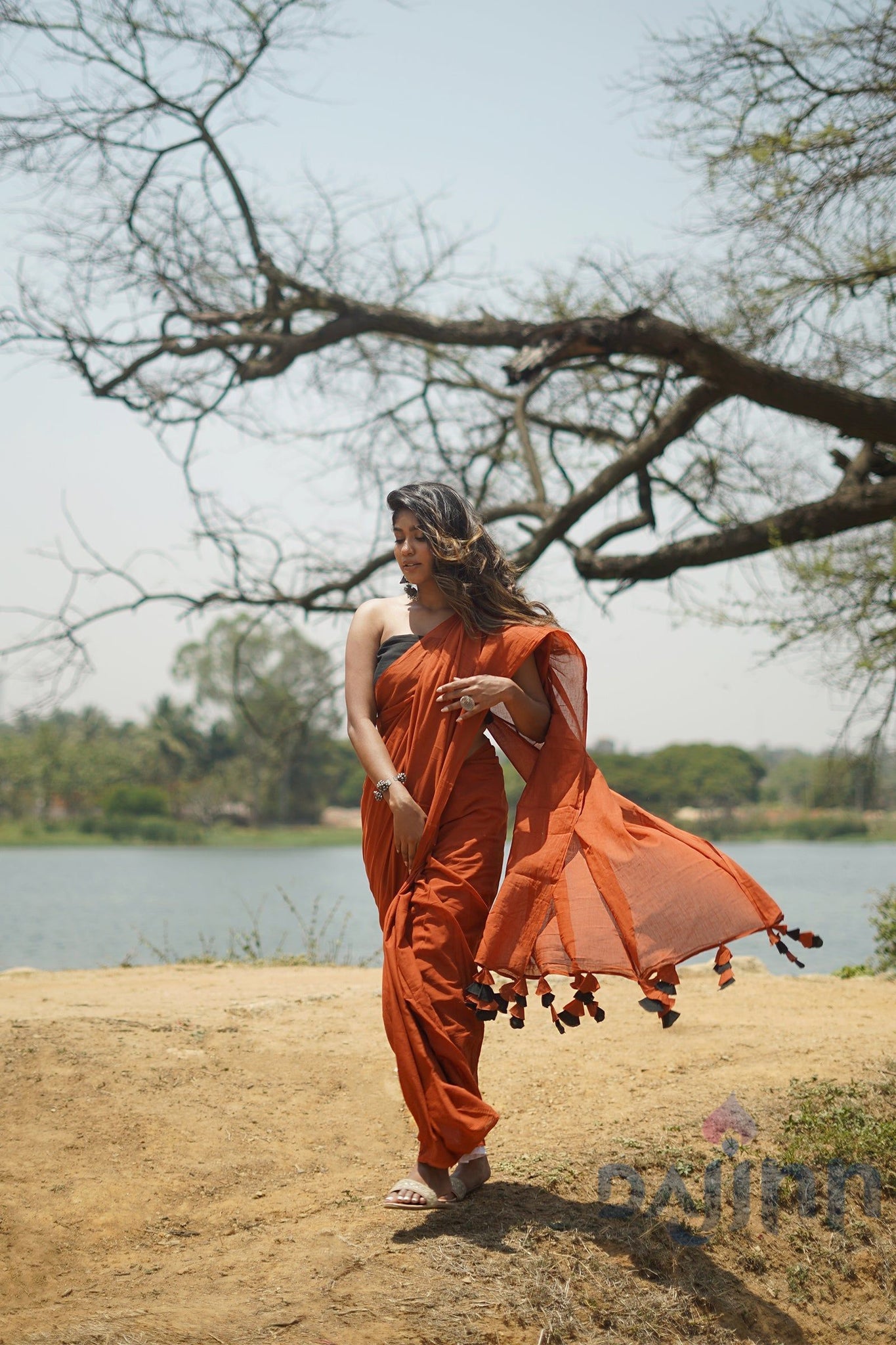 AYSR Boutique Dusk and Dawn Rust Orange  and Black Mulmul Saree